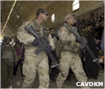 Dutch marines patrolling a market in As Samawah, Southern iraq